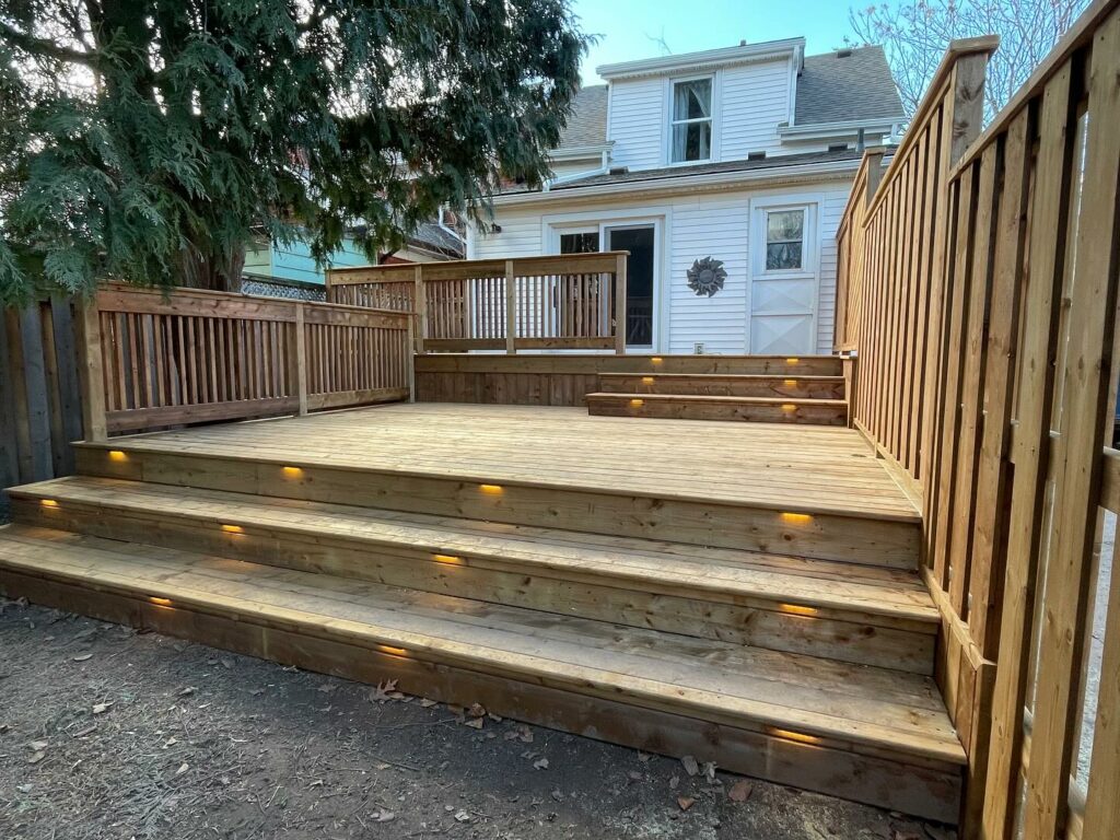 Backyard Wood Deck & Fence With Steps