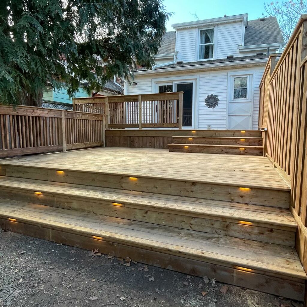 Backyard Wood Deck & Fence With Steps