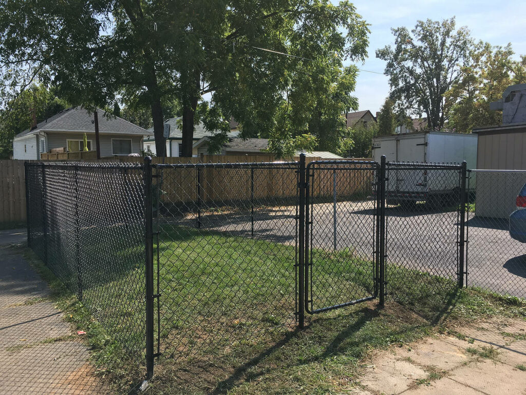 Dog Run Black Chain Link Fence With A Gate