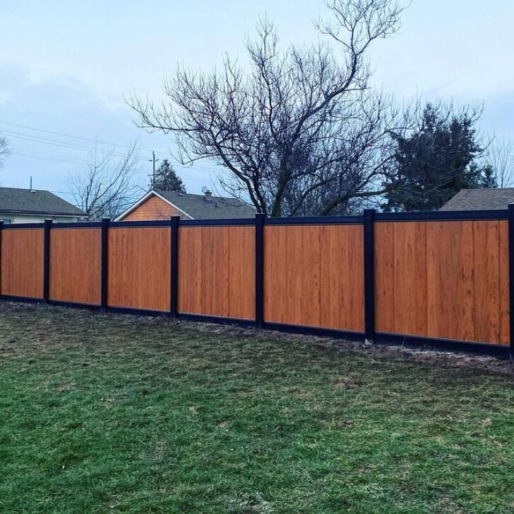 Black Posts & Trim On Vertical Wood Fence