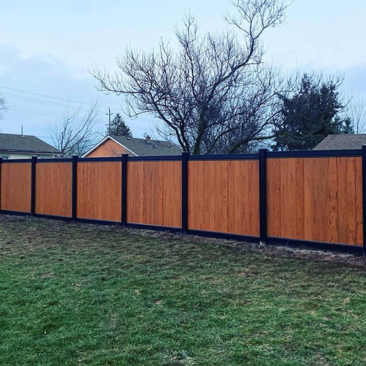 Black Posts & Trim On Vertical Wood Fence