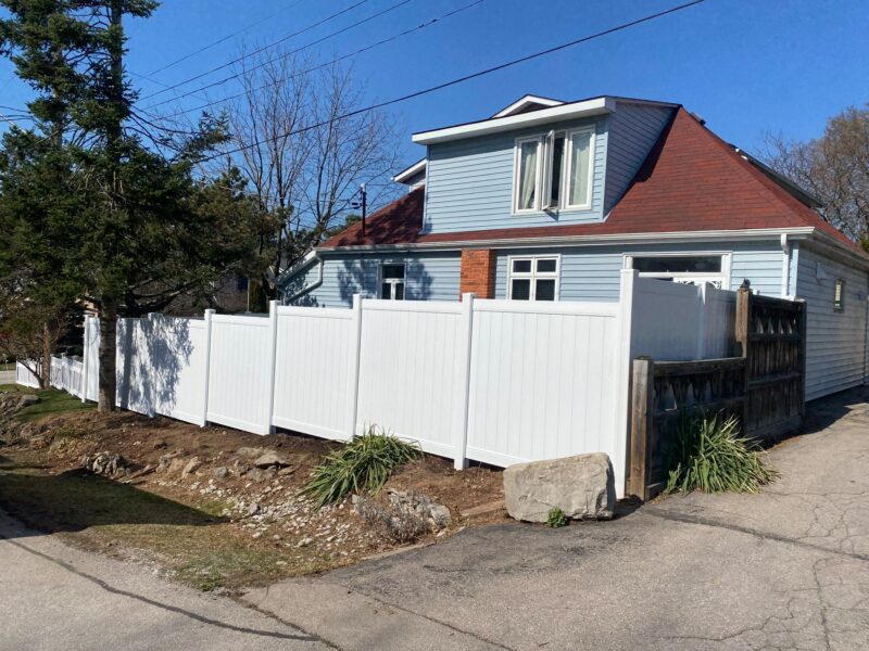Solid white vinyl fence