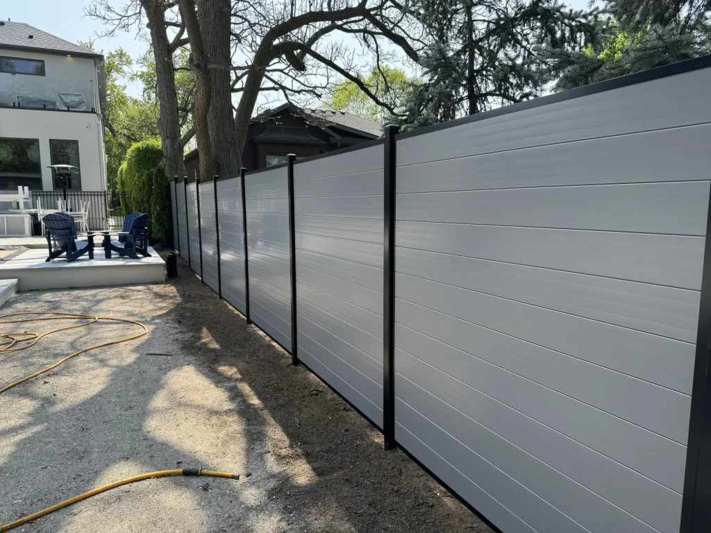 Horizontal Vinyl Fence Between Houses
