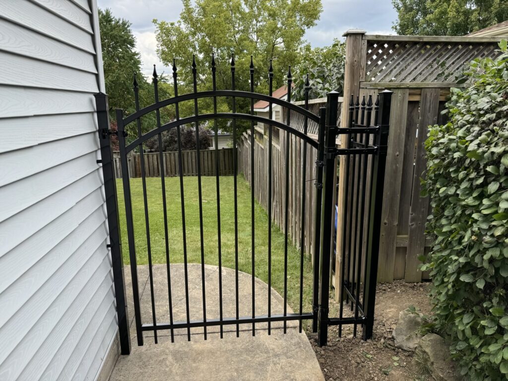 Wrought iron arched gate