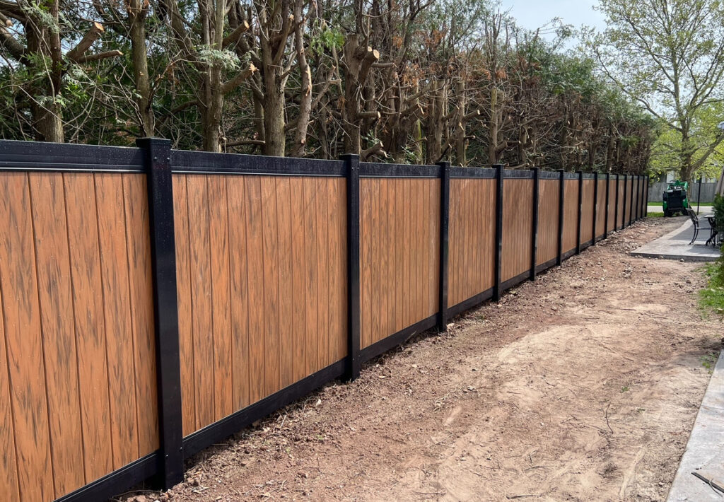 Lava Colour Vinyl Fence With All Black Posts and Top & Bottom Rails