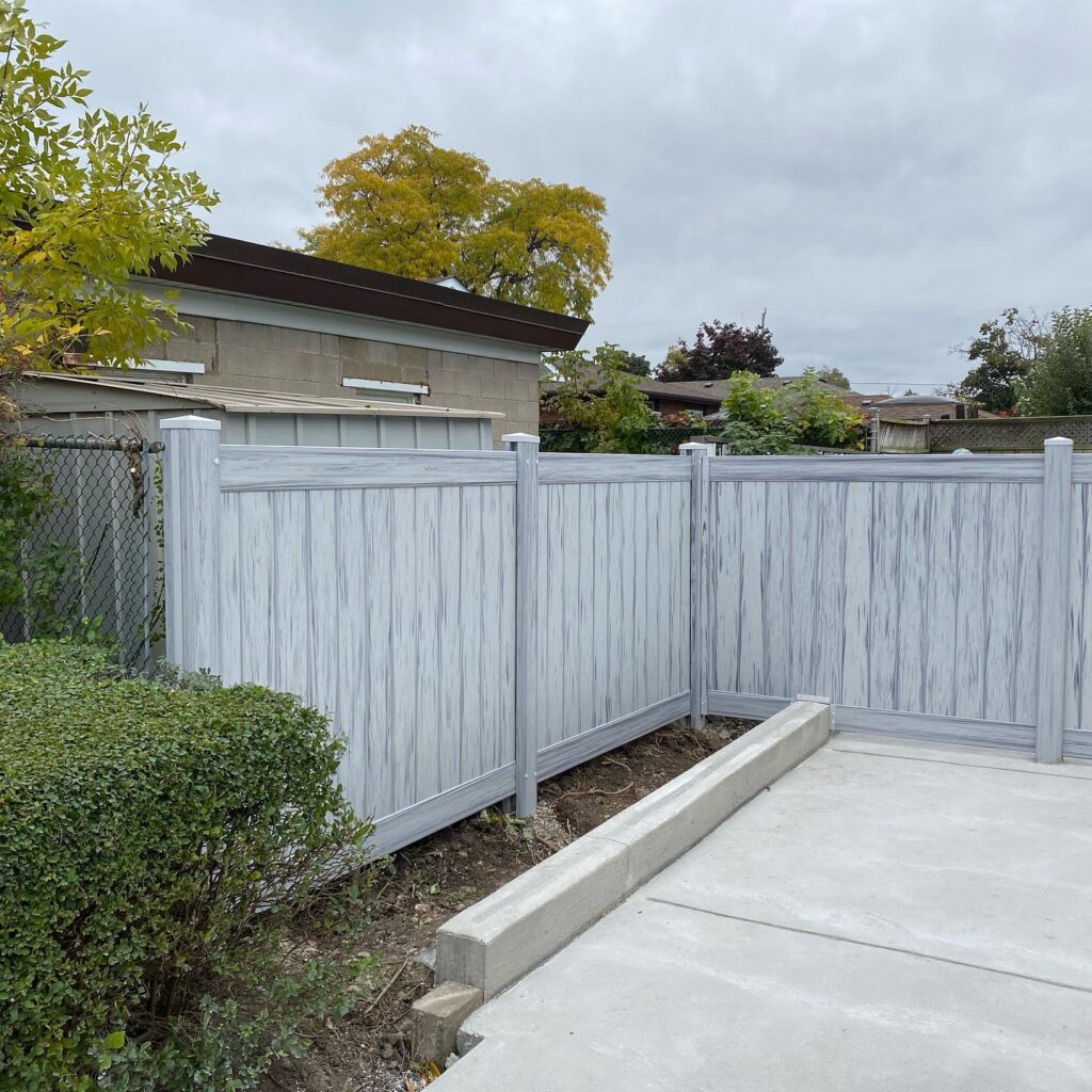 Supernova corner fence around driveway