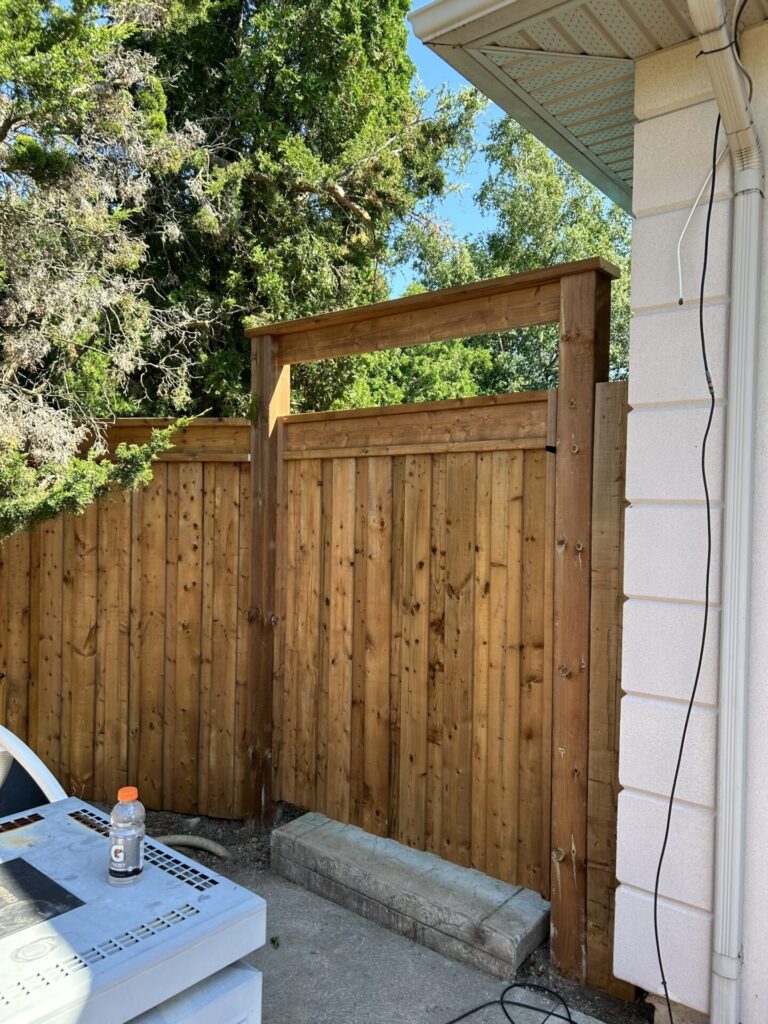 Custom arbour over single wood privacy gate