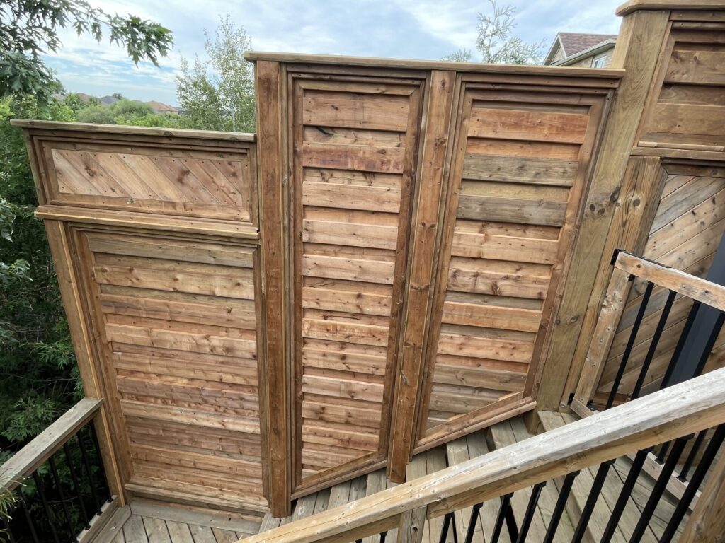Wood stairs and railing with custom fence and gate